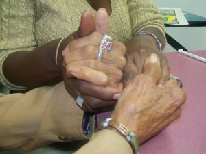 The hands of Dr Margaret Burroughs and Beverly Reed Scott 